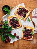 Vanilla and cherry wedges with mint