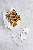Star-shaped spice cookies with chocolate icing