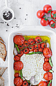 Baked feta cheese with tomatoes