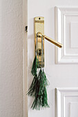 DIY pine-needel tassels on door handle