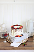 White cake with fresh berries