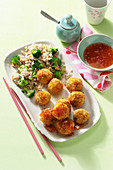 Asian carrot and tofu balls with broccoli rice and sweet chili sauce