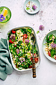 Salad 'To Go' with orzo noodles, rocket, and chive blossoms