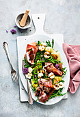 Summer salad with melon and prosciutto