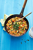 Exotic coconut and vegetable curry with plantains