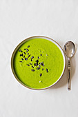 Vegan pea soup with fresh mint and spinach