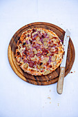 Bacon and grape thin crust pizza