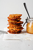 A stack of latkes with applesauce