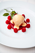 Poached peach with zabaglione and raspberries