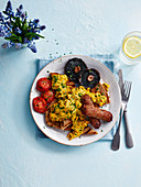 Herby Scrambled Eggs with Crostini Style Toast, Vegan Sausage, Mushrooms and Tomatos