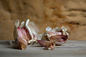 Close up of garlic cloves in their papery skins
