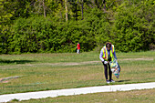 Volunteers cleaning a park, Michigan, USA
