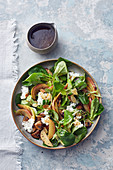 Fitness salad with apples, coarse cream cheese and mushrooms