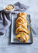 Strudel with bacon, pears and camembert