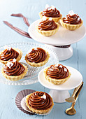 Linzer tartletts with salty caramel and sea salt