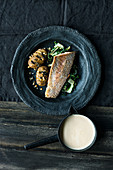 Salmon trout with chard and hasselback potatoes