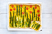 Asparagus tart with peas and cherry tomatoes