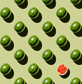 Fresh Watermelon design, with a single halved watermelon, on green background pattern