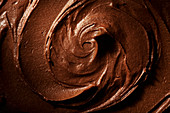 Close detail image of chocolate frosting swirl