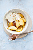 Warm apple and pear compote with labneh ice cream