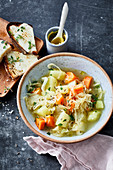 Sauerkraut-celery stew with raclette crostini
