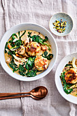 Creamy spinach-parsley root stew with sourdough and feta dumplings