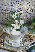 Nostalgic Christmas angel in a collector's cup