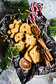 Gingerbread cookies and spices in wooden box