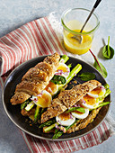 Wholemeal croissant with asparagus, egg and sauce hollandaise