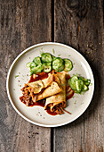 Wholemeal crêpes with pulled beef and cucumber salad