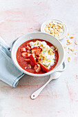 Melon-strawberry smoothie bowl with ricotta cream