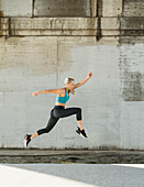 An athletic woman jumping