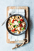Summer pasta with tomatoes and courgettes
