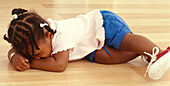 Girl lying on floor