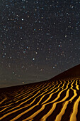 Night sky over sand dunes, Mesr desert, Iran