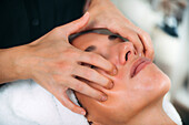 Ayurvedic face massage therapy with aromatherapy oils
