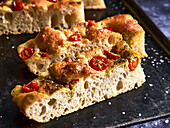 Focaccia with cherry tomatoes and pesto