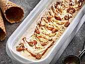 Homemade caramel ice cream with peanuts