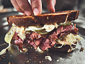 Reuben sandwich with cured beef brisket, cheese and sauerkraut