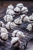 Small meringue sandwiches with chocolate