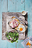 Croque Madame and Croque Monsieur with rocket salad