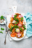 Potato fritters with smoked salmon and radishes