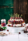 Chocolate tart with cherries and poppy seeds