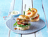 Chicken burger with caramelized onion and potato bun