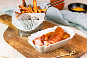 Currywurst (sausage with ketchup & curry powder) with chips