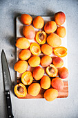 Apricots on a Slicing Board