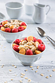 Healthy oatmeal with raspberries and golden berries