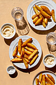 Roasted potatoes and mayonnaise on the table