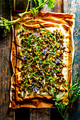 Ricotta pizza with aubergines and rocket