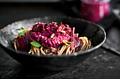 Wholemeal spaghetti with beetroot pesto